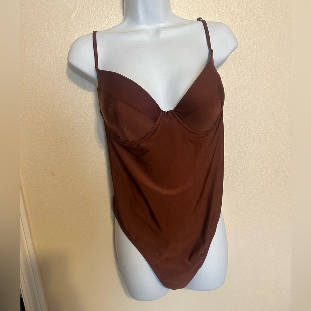 NEW Woman’s Prettylittlething brown one piece swimsuit size 12!!!